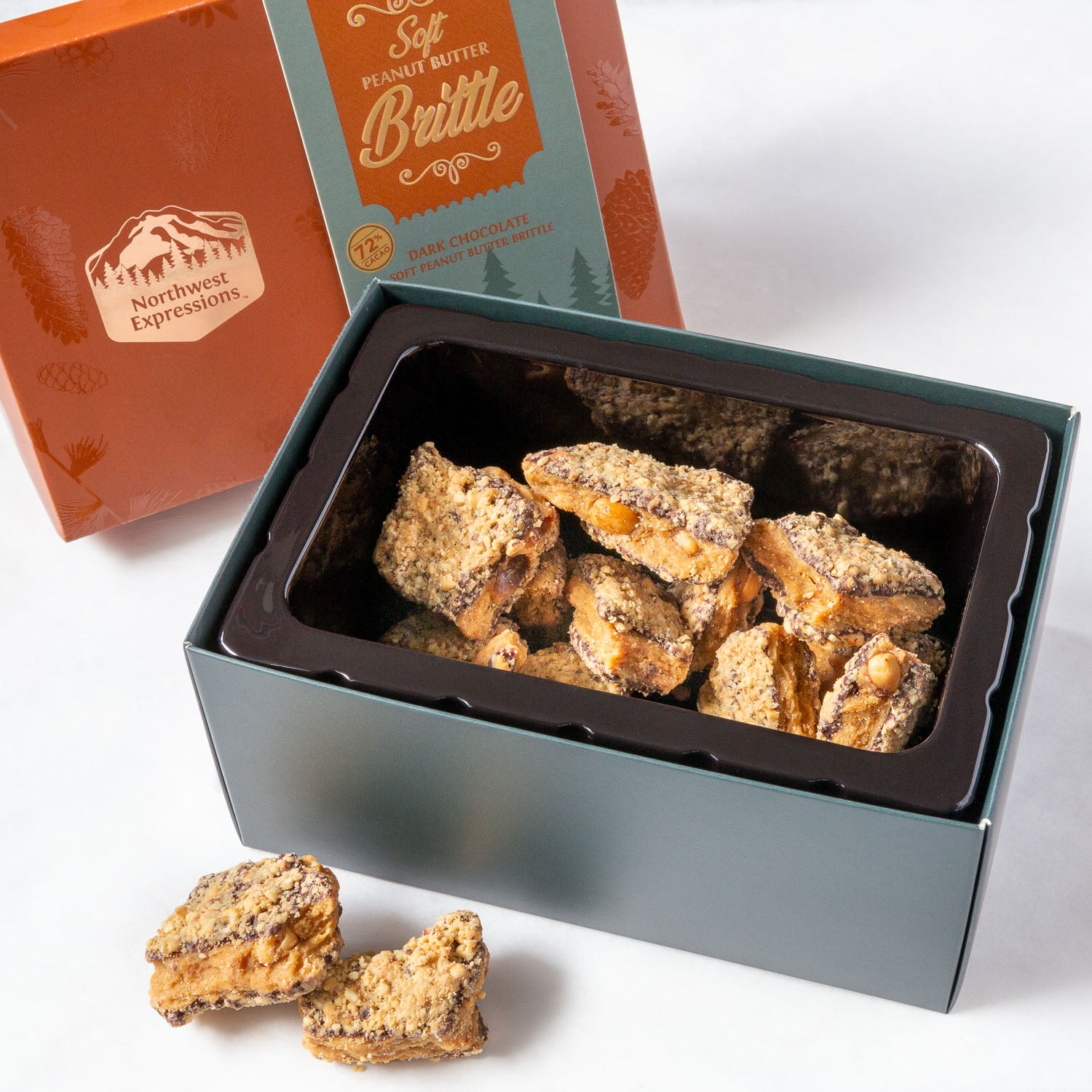 dark chocolate covered soft peanut butter brittle in an attractive gift box