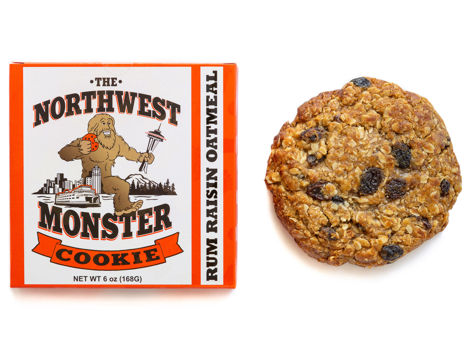  the northwest rum raisin monster cookie sitting beside the box it came in