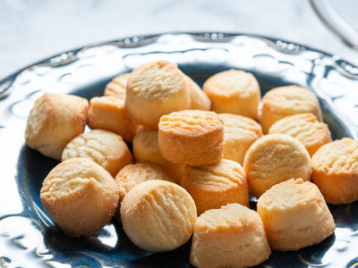 tiny classic shortbread cookies on a plate
